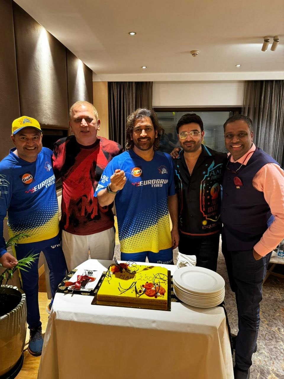 A group of men celebrating bithday